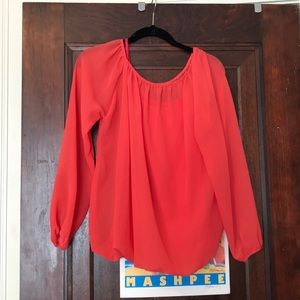 Coral/red colored blouse